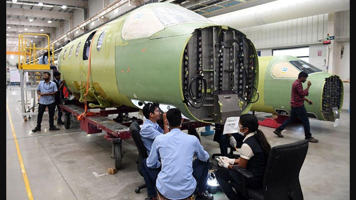 Engineers on an aerostructures build
