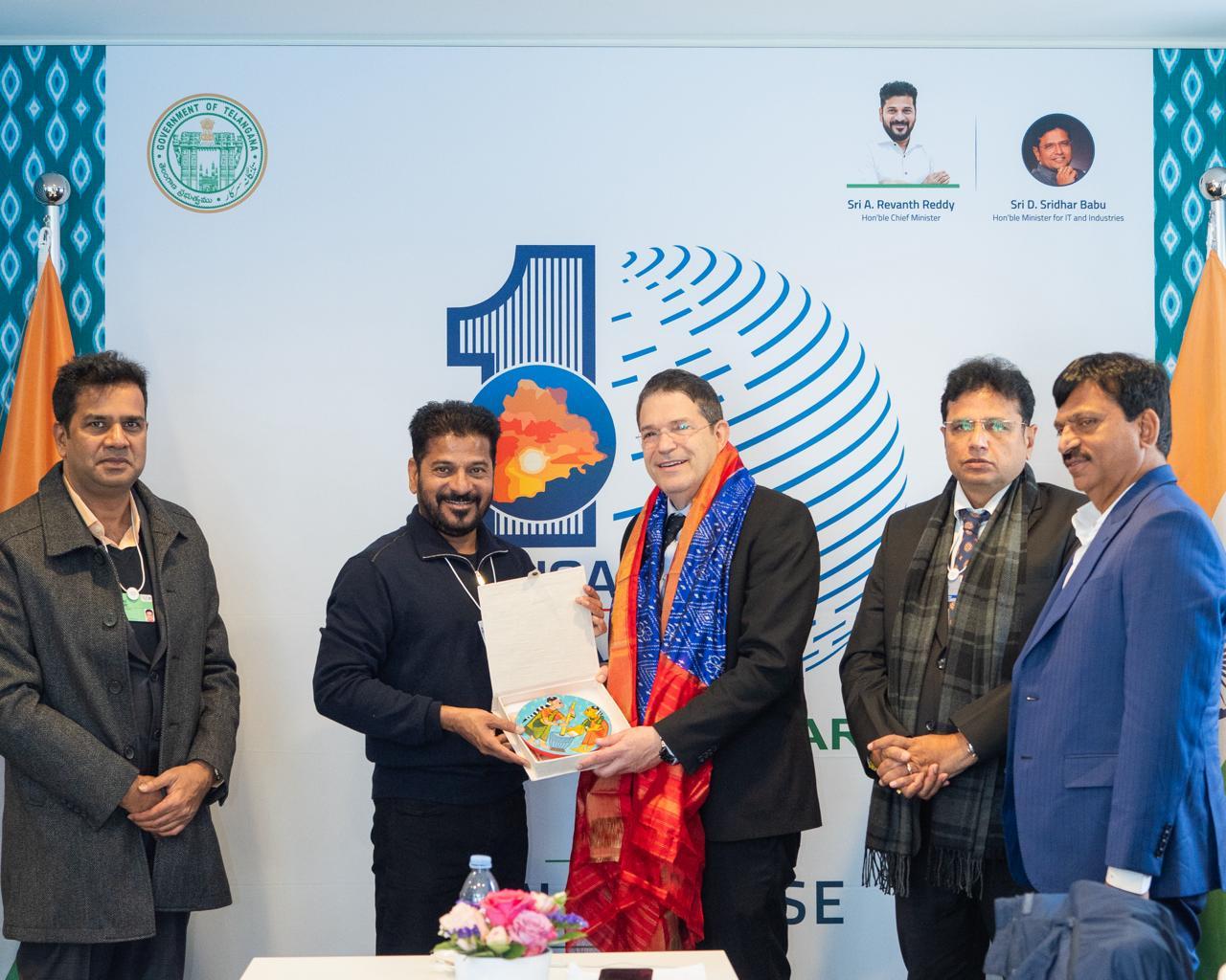 The Chief Minister meeting a technology leader abroad