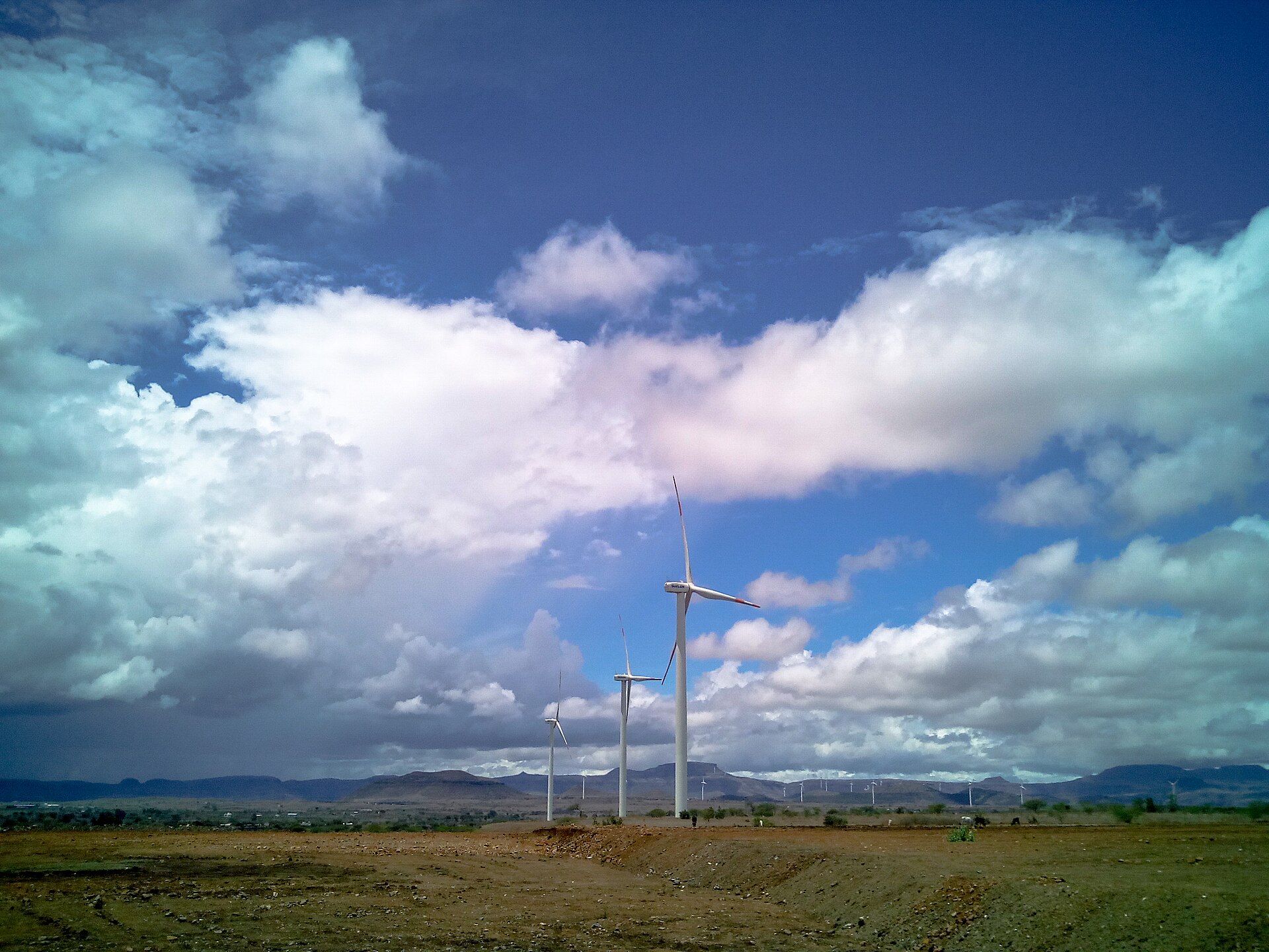 Wind turbines, part of Telangana's renewable generation mix