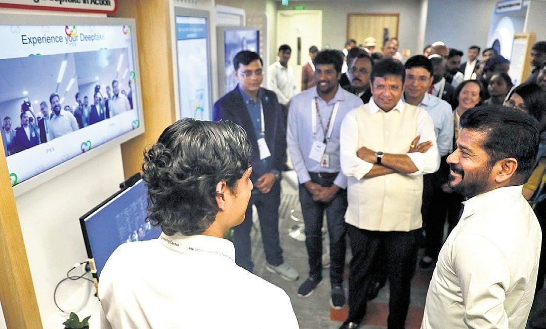 An engineer demonstrating an AI project at a technology centre