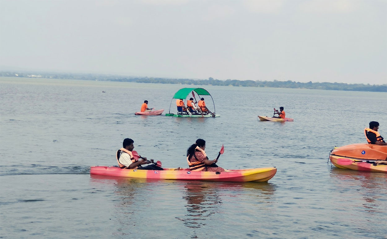 The Vikarabad landscape: forested hills looking out over fields and a reservoir