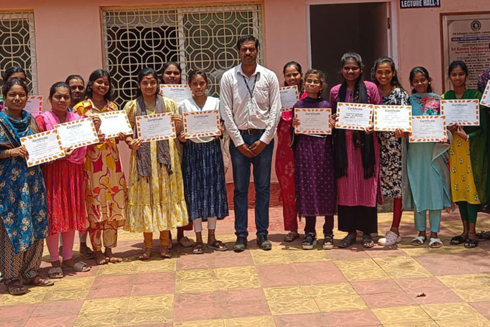 Students training on laptops through a TASK industry-academia programme in Telangana